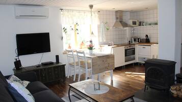 Apartment, 2 Bedrooms | Living area | Flat-screen TV