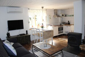 Apartment, 2 Bedrooms | Living area | Flat-screen TV