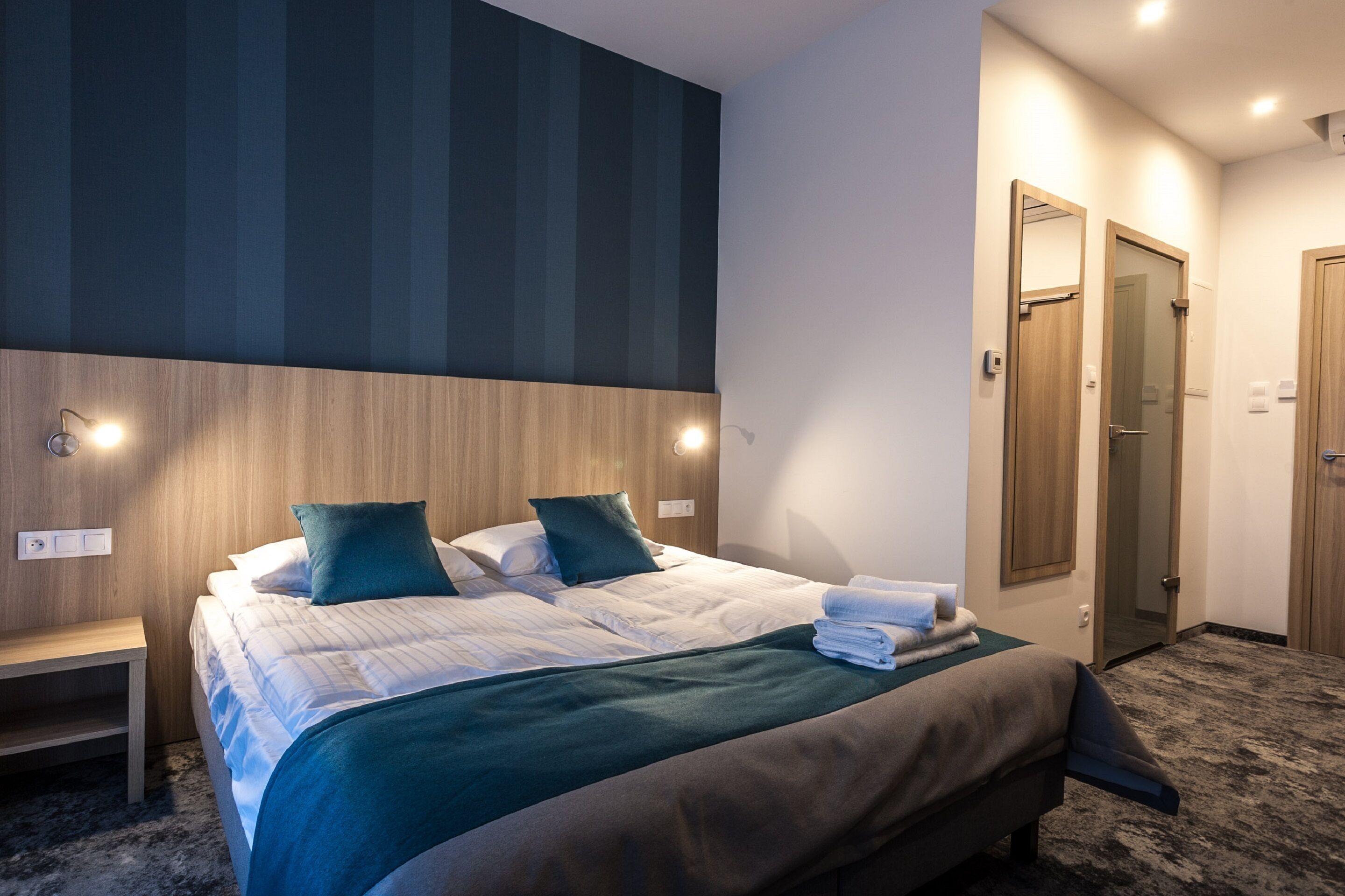 desk, blackout curtains, iron/ironing board, free cots/infant beds