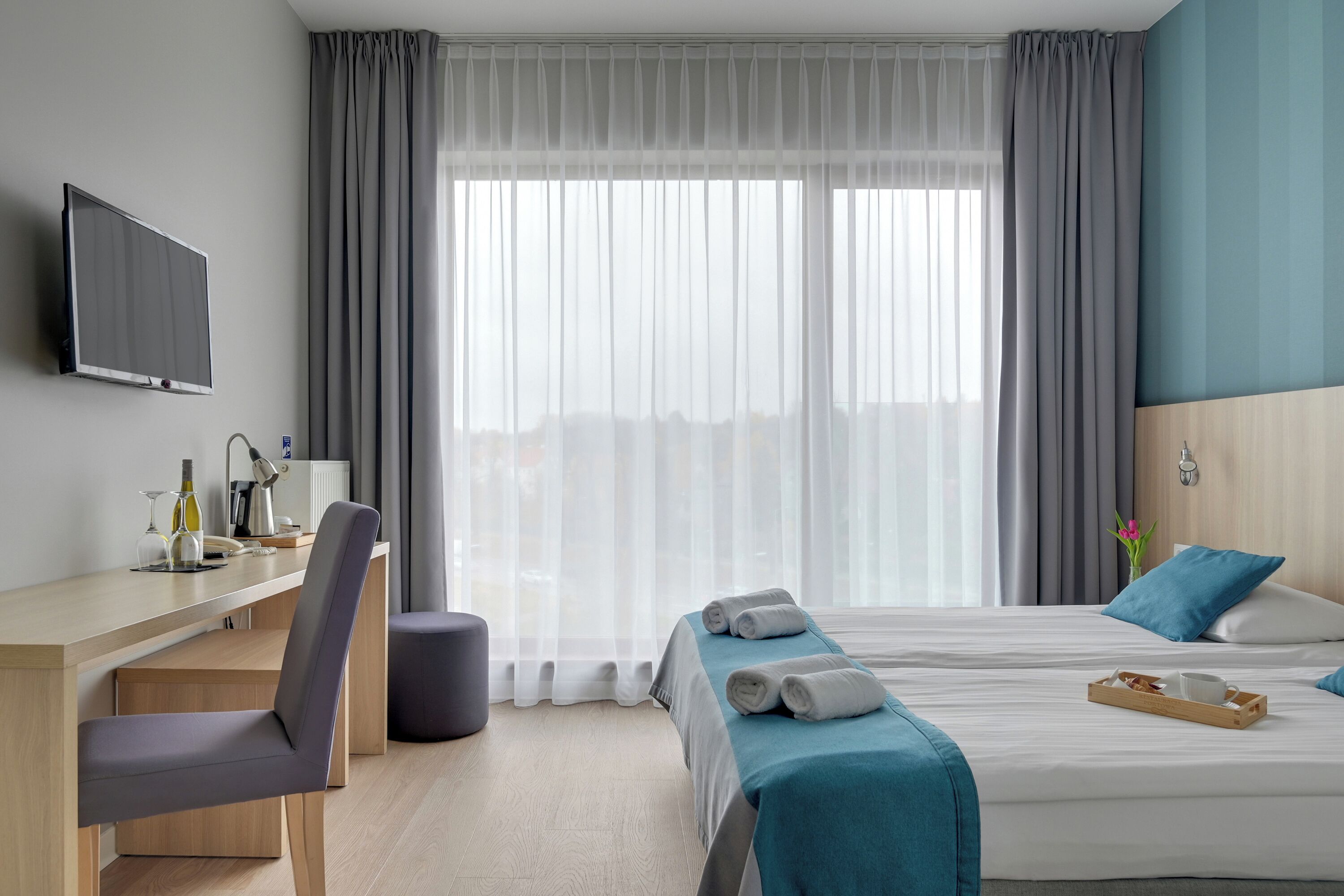 Desk, blackout curtains, iron/ironing board, free cots/infant beds