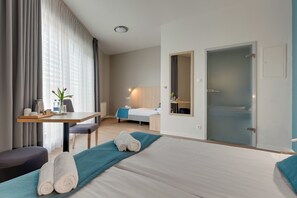 Desk, blackout curtains, iron/ironing board, free cots/infant beds