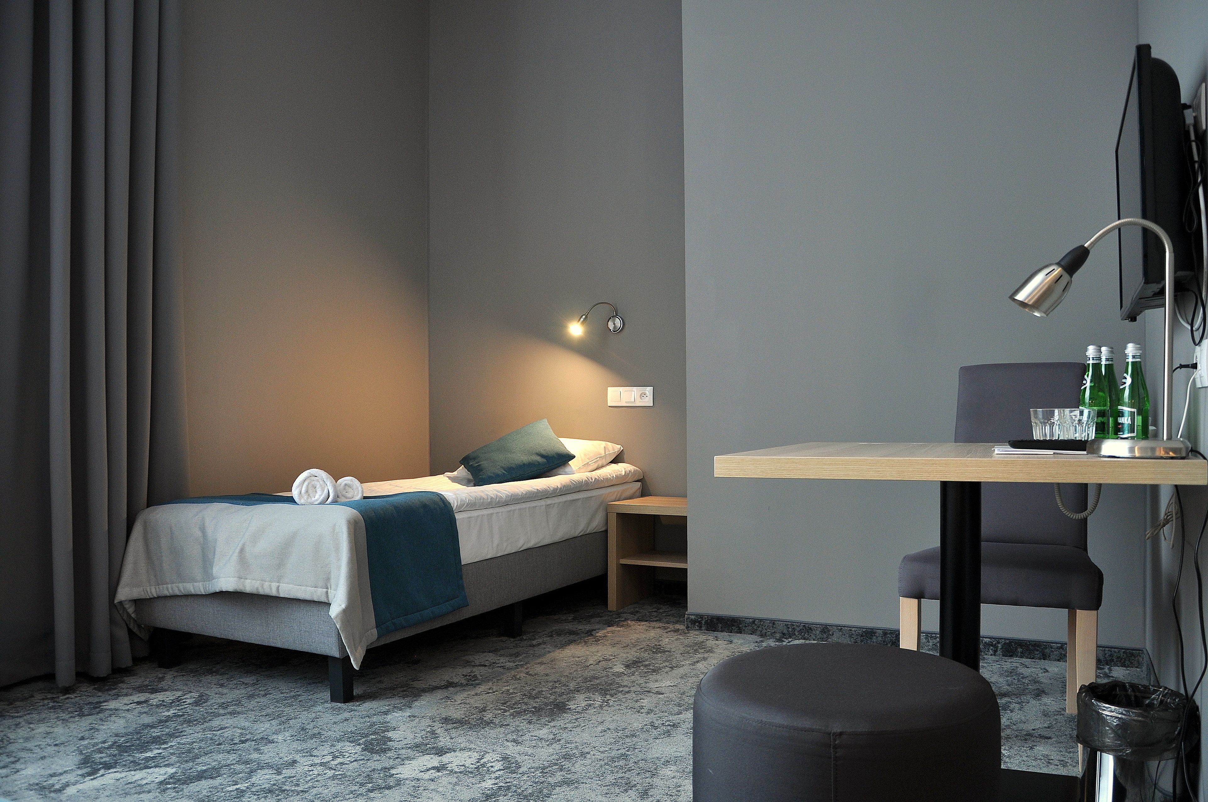 desk, blackout curtains, iron/ironing board, free cots/infant beds