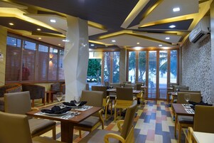 Breakfast, lunch, dinner served; beach views