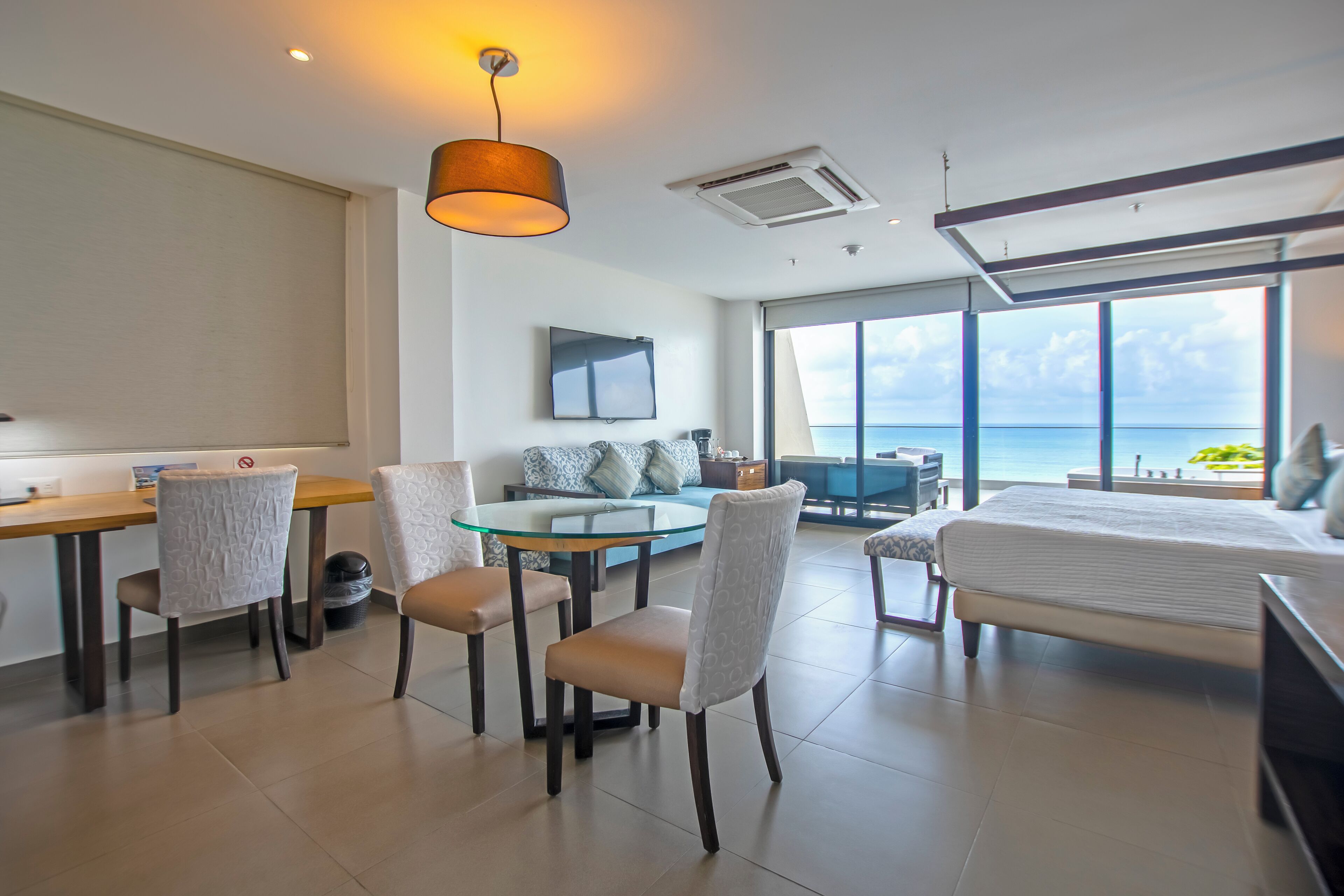 Suite Premium, 1 cama King size, vista al mar con jacuzzi privado | Ropa de cama de alta calidad y minibar 
