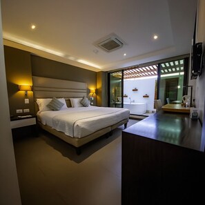 Habitación Premium, 1 cama King size, con balcon lateral | Ropa de cama de alta calidad y minibar 