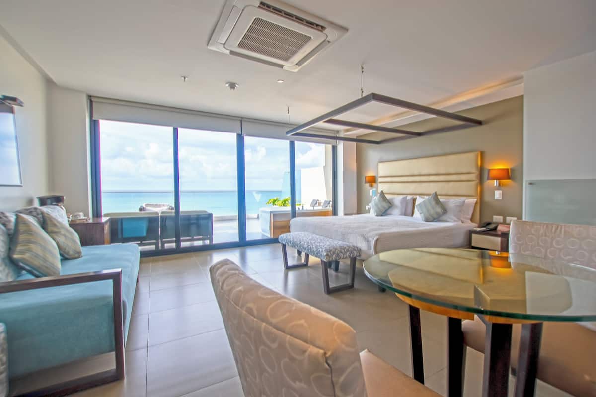 Suite Premium, 1 cama King size, vista al mar con jacuzzi privado | 1 bedroom, premium bedding, minibar, in-room safe
