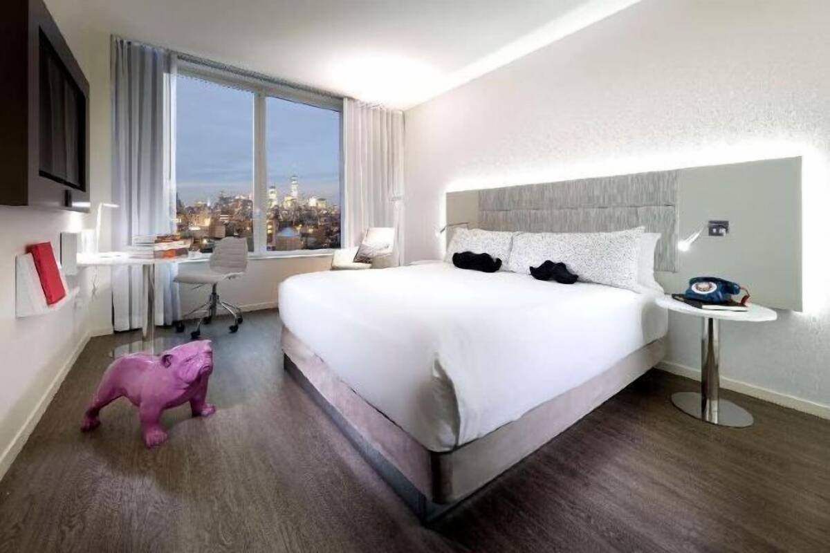 Premium bedding, free minibar items, in-room safe, blackout curtains