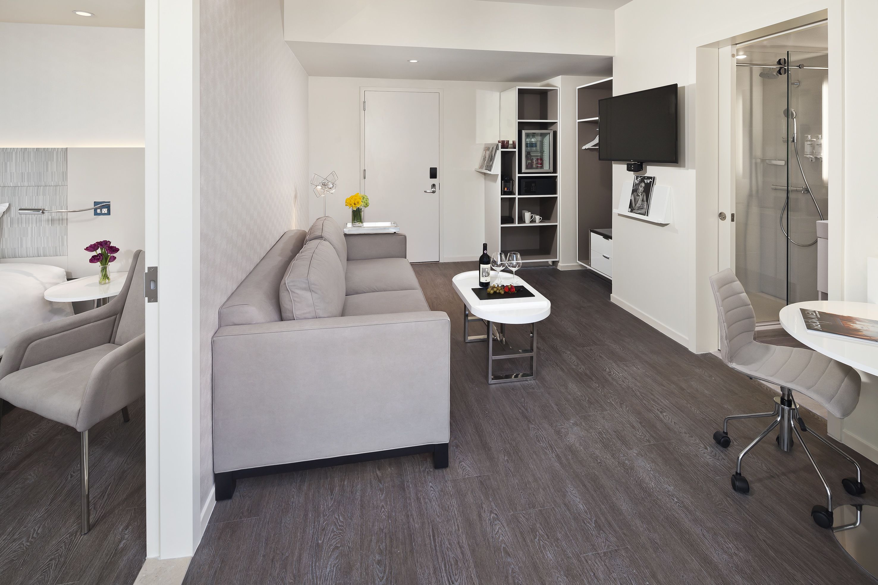 the townhouse suite | premium bedding, in-room safe, desk, blackout curtains