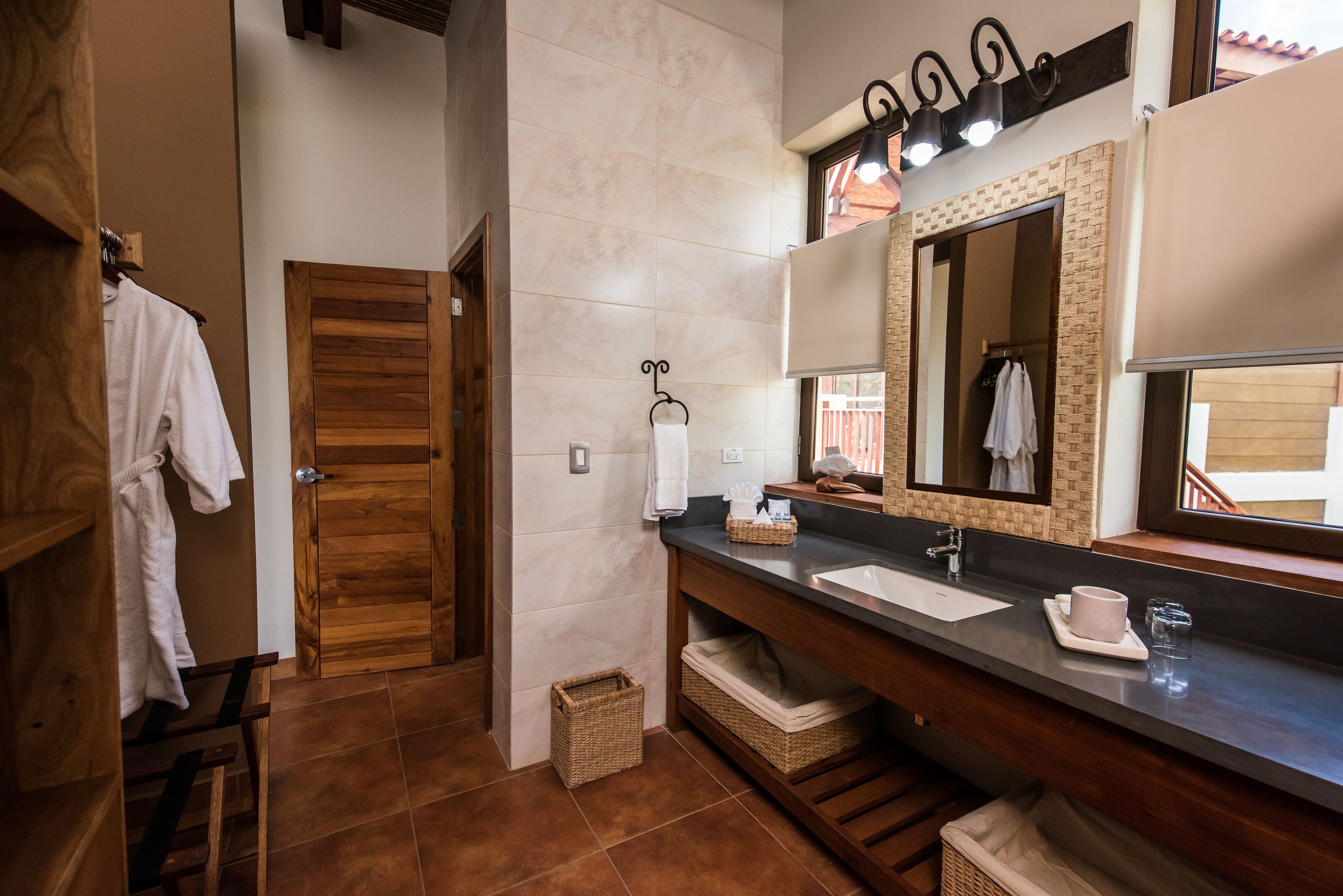 premium suite | bathroom | shower, free toiletries, bathrobes, towels