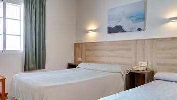 Desk, free WiFi, bed sheets