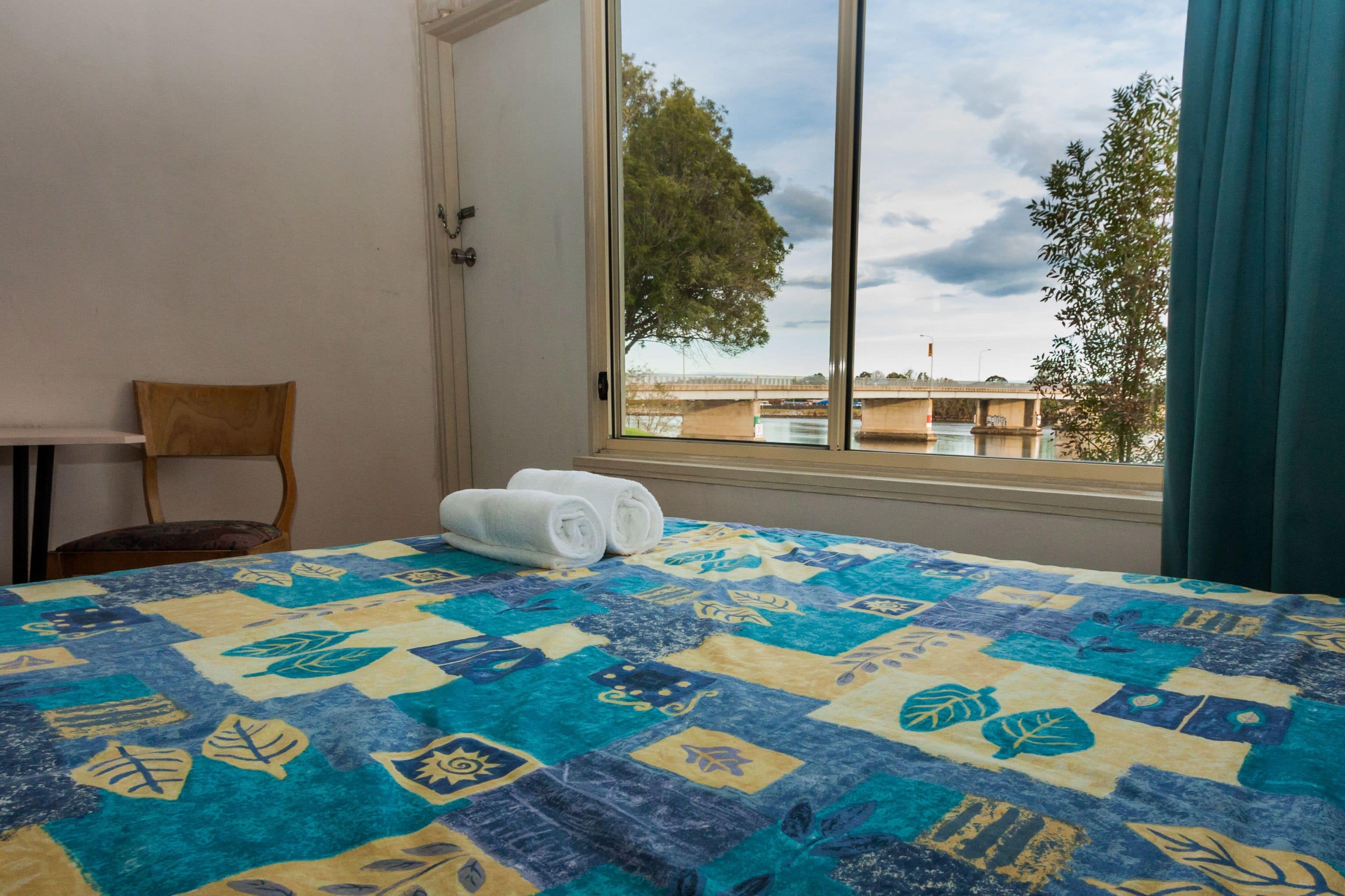 Riverfront Family Room | Desk, iron/ironing board (on request), free WiFi, bed sheets