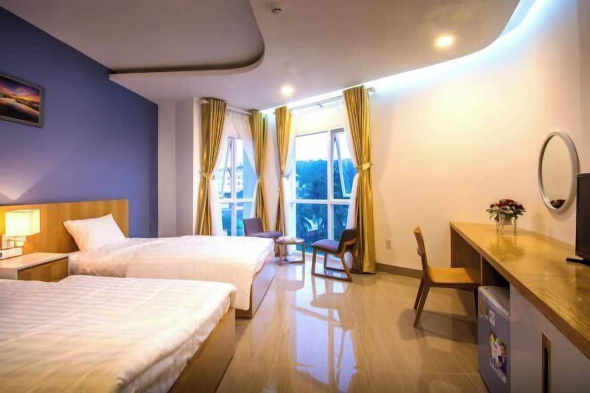 Premium bedding, memory-foam beds, minibar, desk