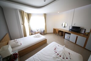 Deluxe Triple Room, City View | Premium bedding, memory foam beds, minibar, desk - Sailing Hotel (Phu Quoc)