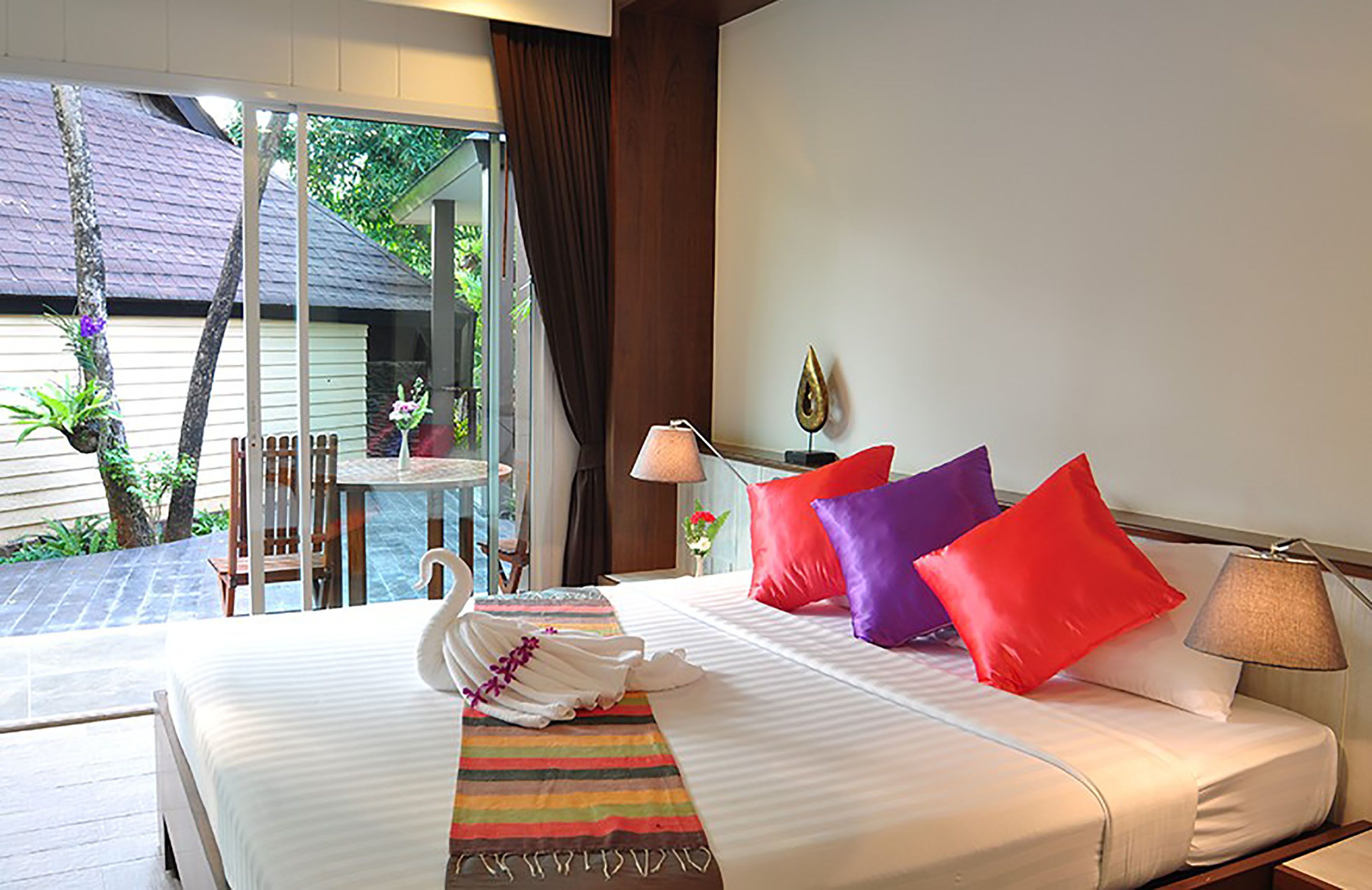 family villa, garden view, garden area | minibar, in-room safe, desk, iron/ironing board