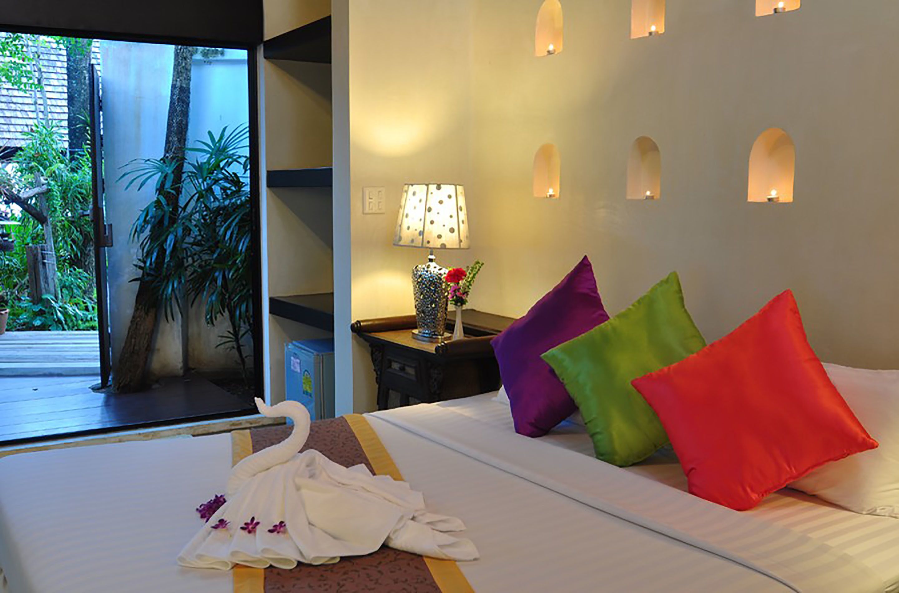 family chalet, garden view, garden area | minibar, in-room safe, desk, iron/ironing board