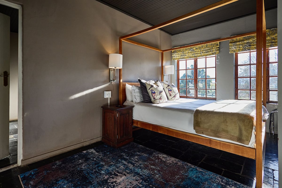 Familie suite, 2 slaapkamers, open haard, uitzicht op de stad | 1 slaapkamer, lakens van Egyptisch katoen, luxe beddengoed
