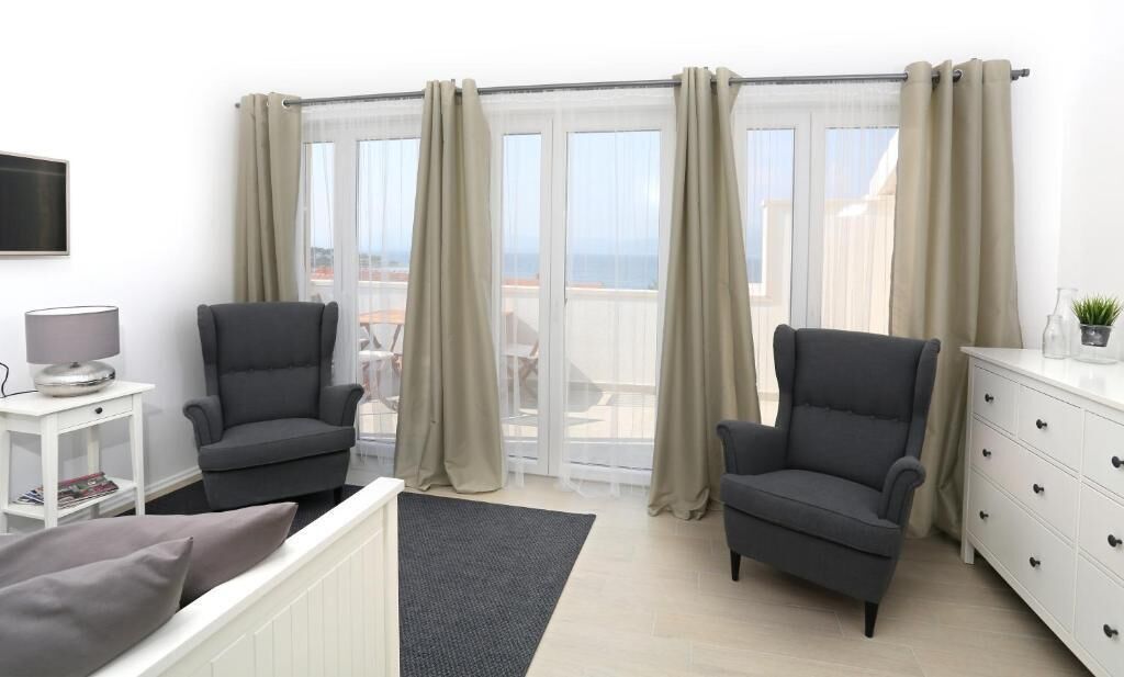 Superior Suite, Balcony, Sea View | Premium bedding, minibar, desk, laptop workspace