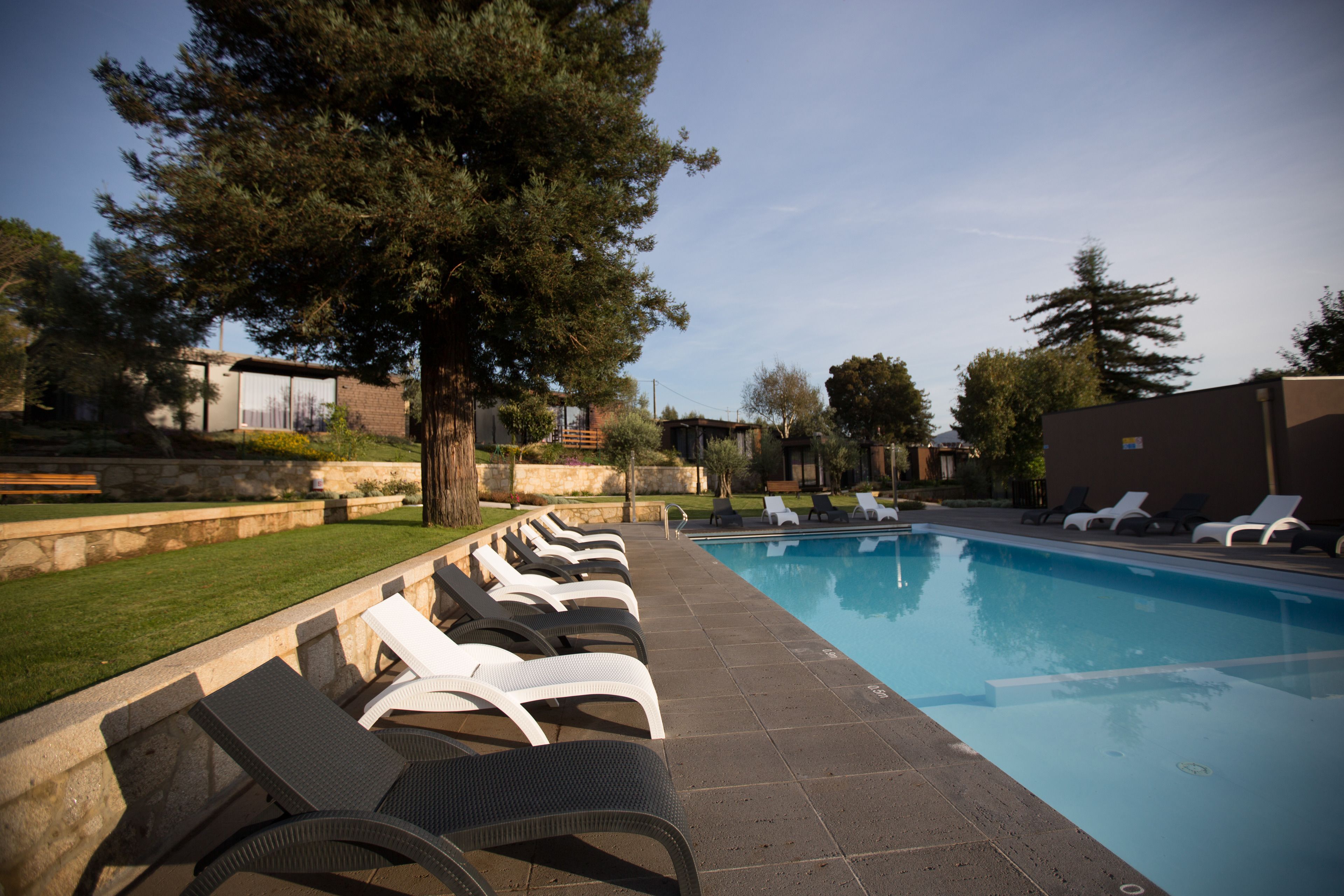 Indoor pool, seasonal outdoor pool, pool umbrellas, pool loungers