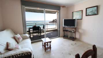 Apartment, 2 Bedrooms, Terrace, Sea View | Living room | Flat-screen TV