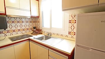 Apartment, 2 Bedrooms, Terrace, Sea View | Private kitchen | Fridge, microwave, stovetop, coffee/tea maker
