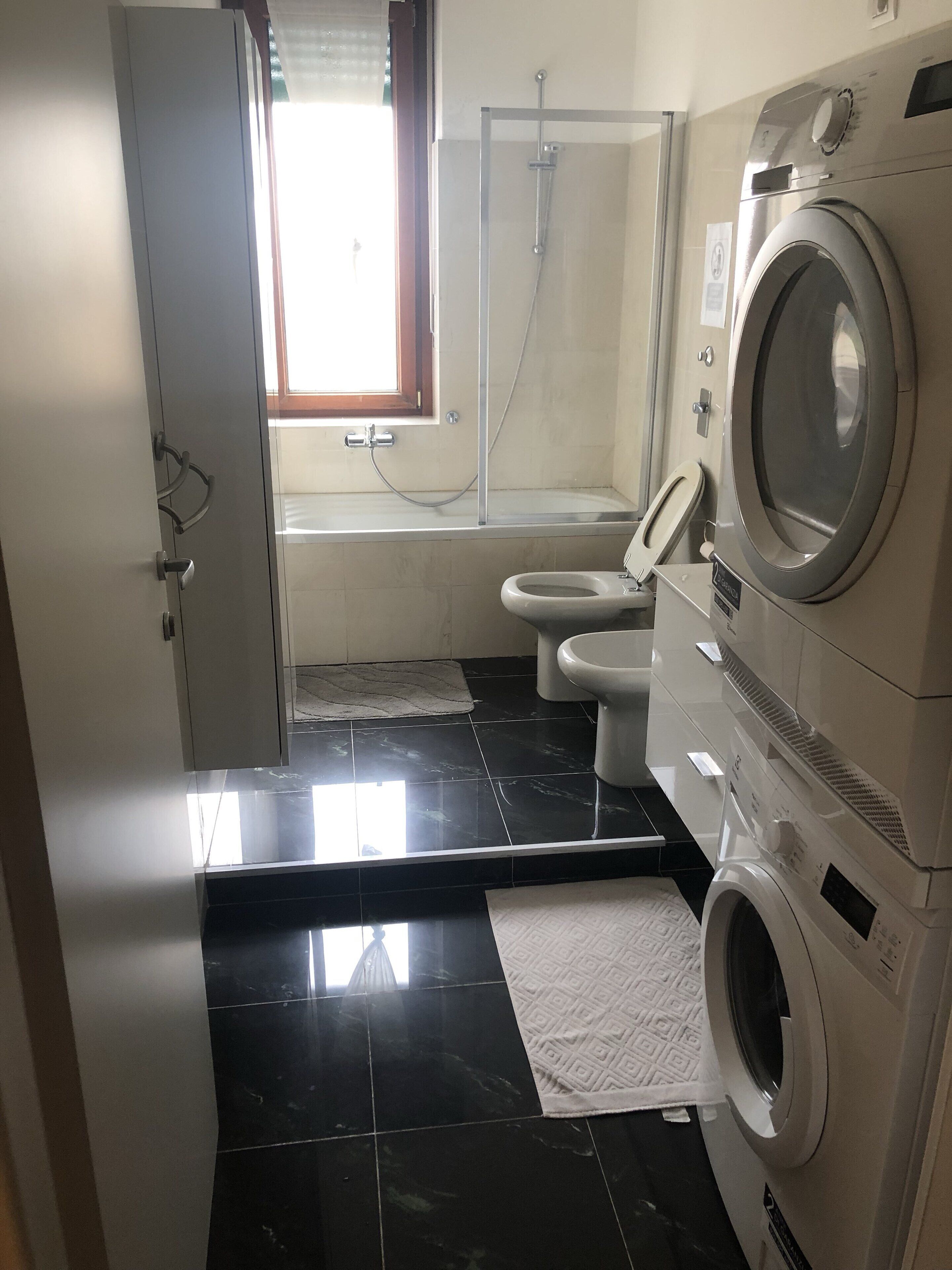 Shower, free toiletries, hair dryer, towels