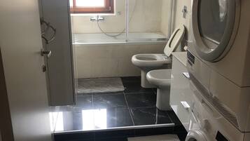 Shower, free toiletries, hair dryer, towels