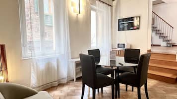 Apartment, 2 Bedrooms (Split Level) | Living area | Flat-screen TV