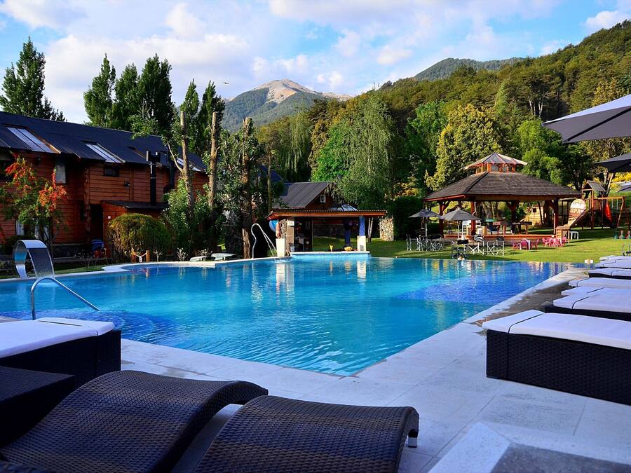 Indoor pool, outdoor pool, pool umbrellas, pool loungers