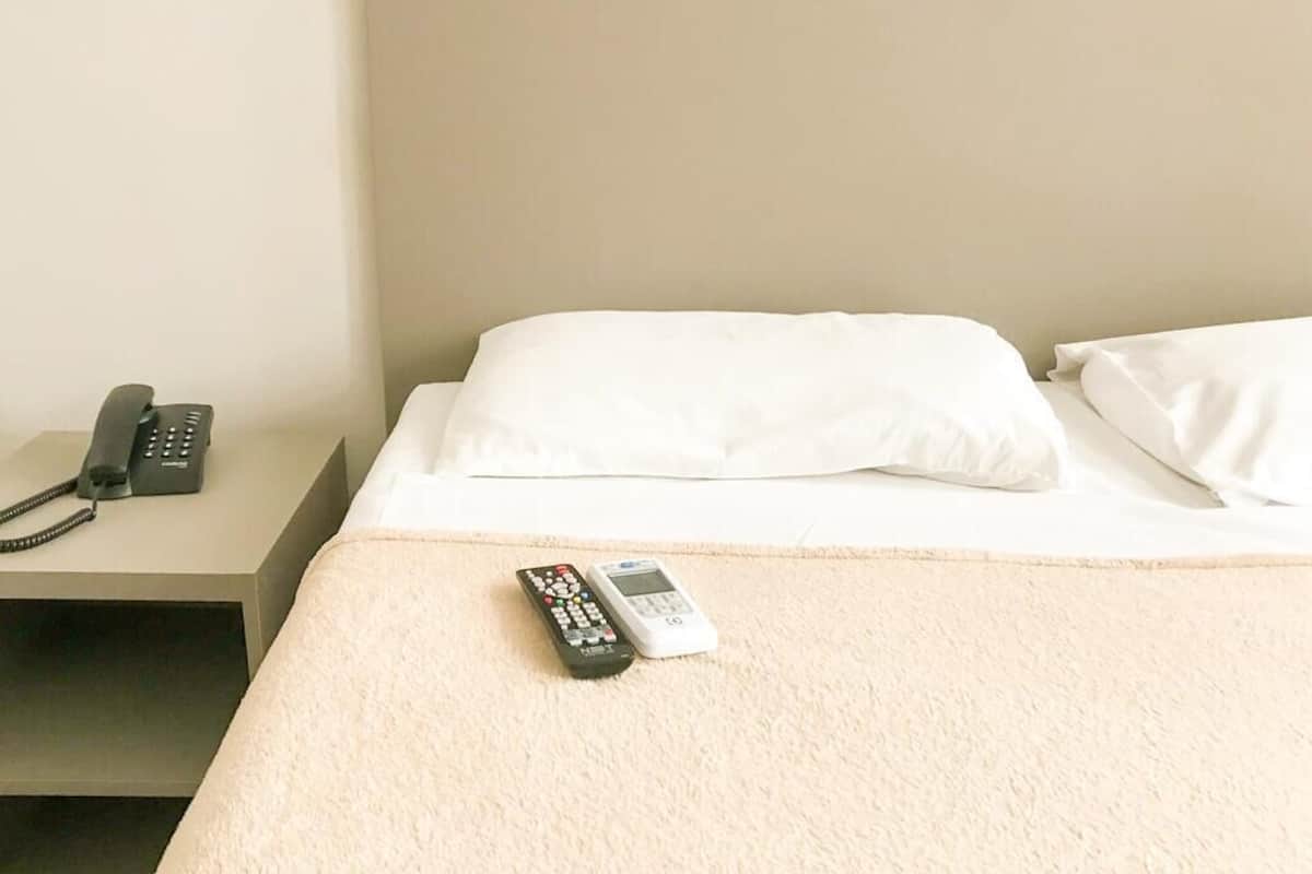 Economy tweepersoonskamer | Een minibar, geluiddichte muren, gratis wifi, beddengoed