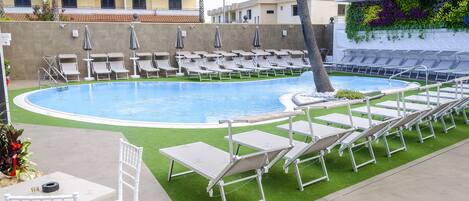 Seasonal outdoor pool, pool umbrellas, pool loungers