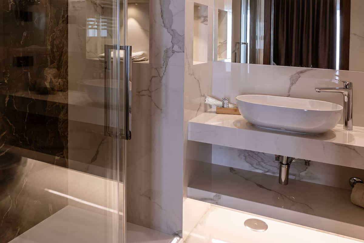 superior triple room | bathroom | free toiletries, hair dryer, bidet, towels