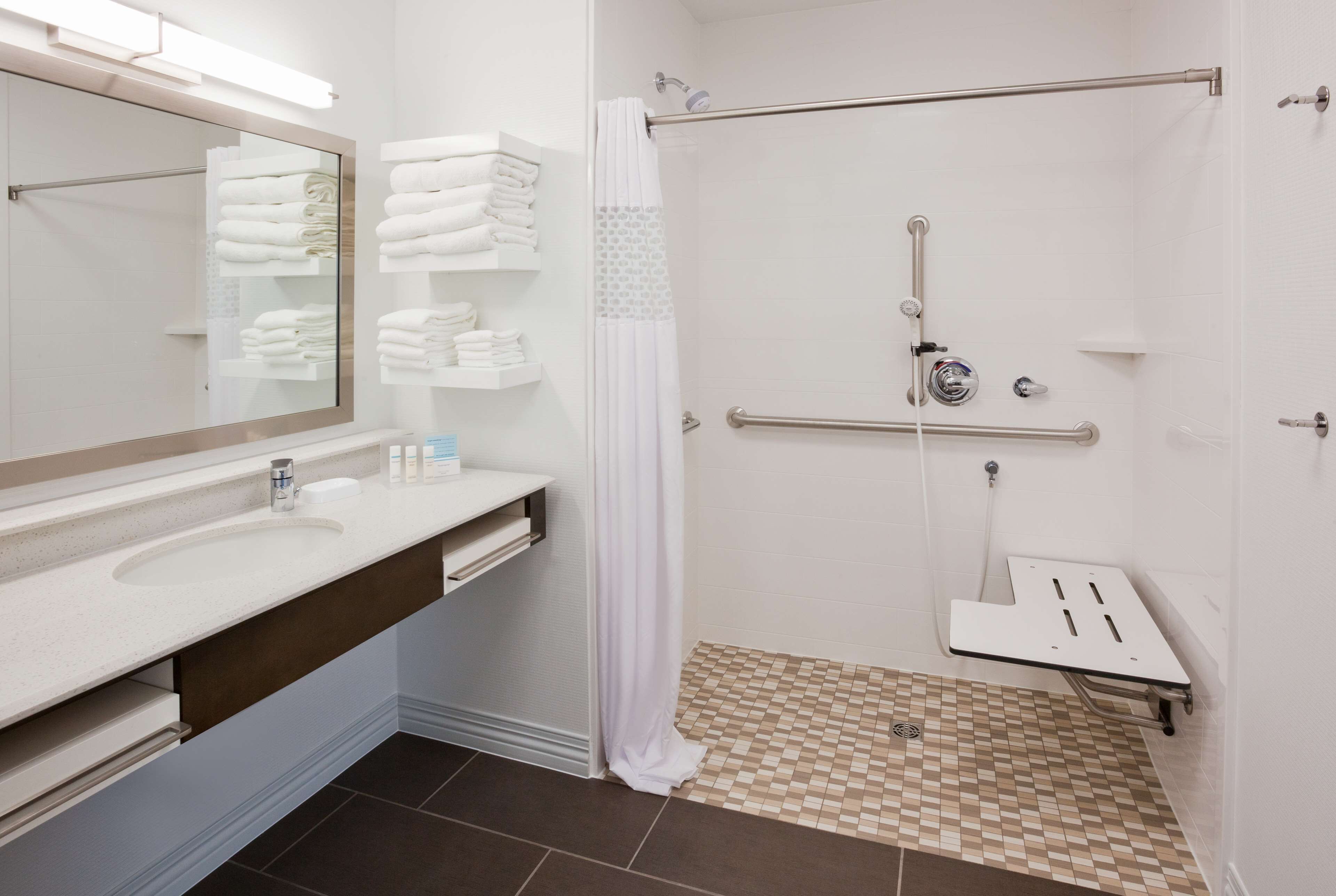 studio, 1 king bed, accessible, non smoking (roll in shower) | bathroom | combined shower/bathtub, hair dryer, towels