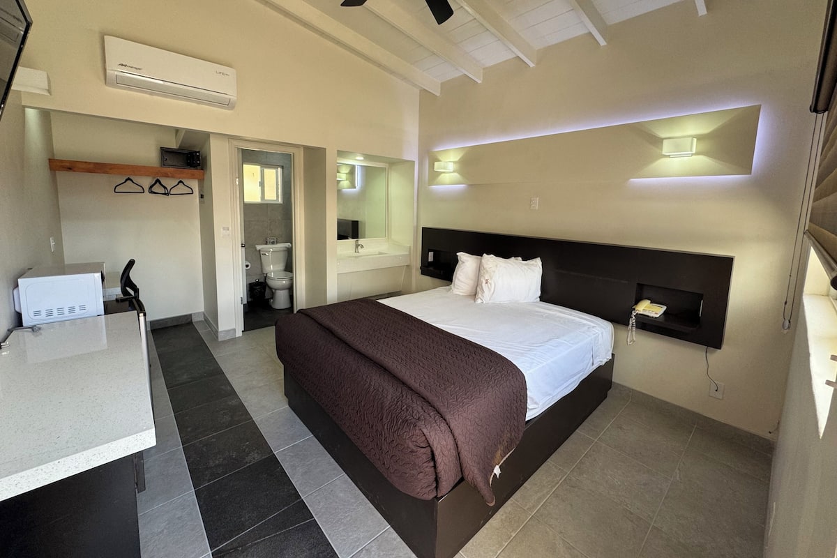 Standard Cabin, 1 Queen Bed | Minibar, in-room safe, iron/ironing board, bed sheets