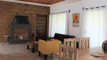Basic Villa | Living area | 42-inch LED TV with cable channels, TV