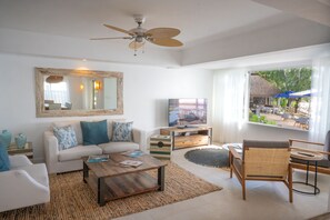 Villa, Beachfront | Living area | 32-inch LCD TV with satellite channels, TV - Seapoint Boutique Hotel (Grand-Baie)