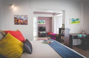 Executive Suite, 1 King Bed (Guest House) | Premium bedding, iron/ironing board, free WiFi