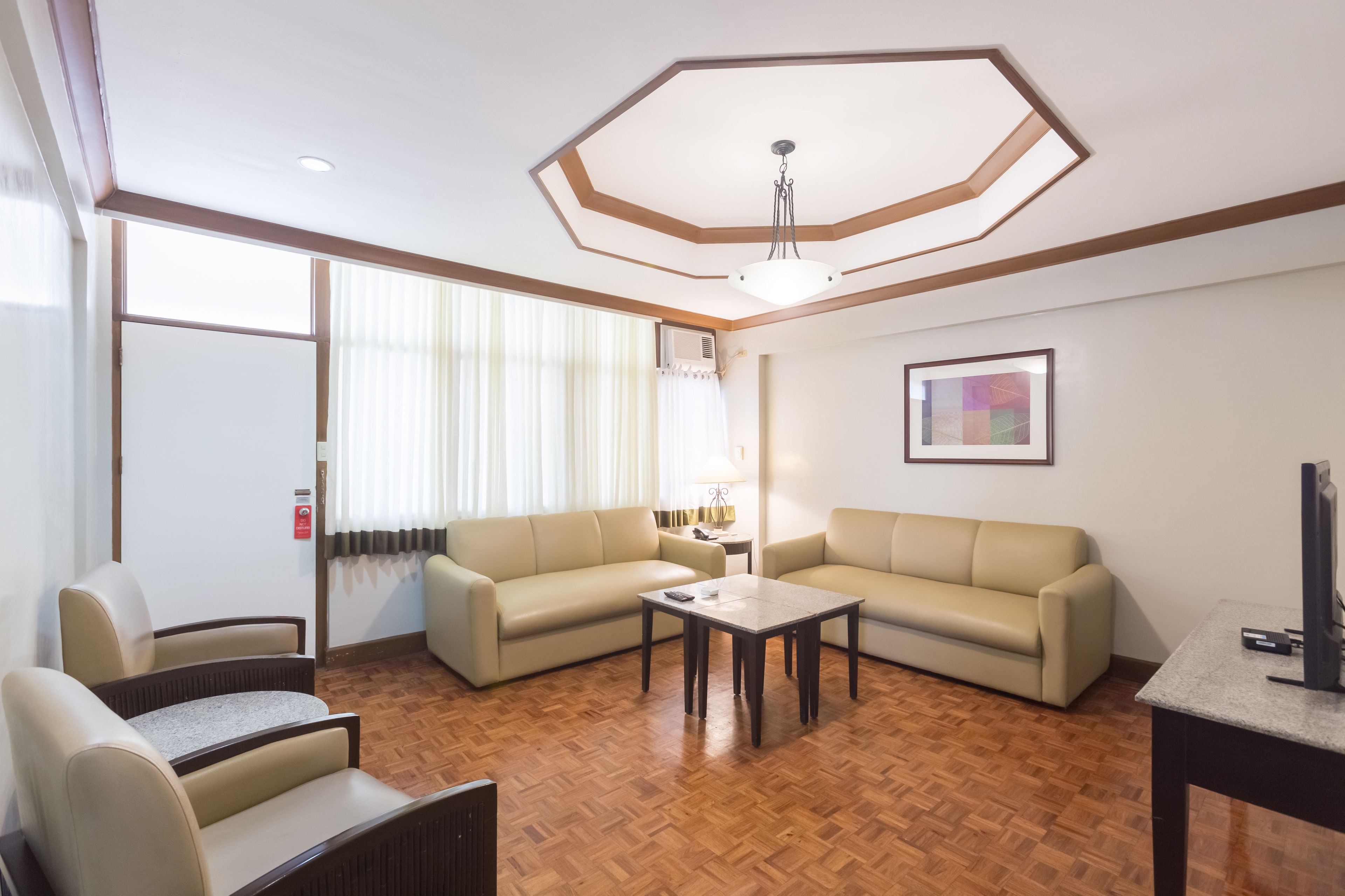 two bedroom premiere suite | living area | flat-screen tv