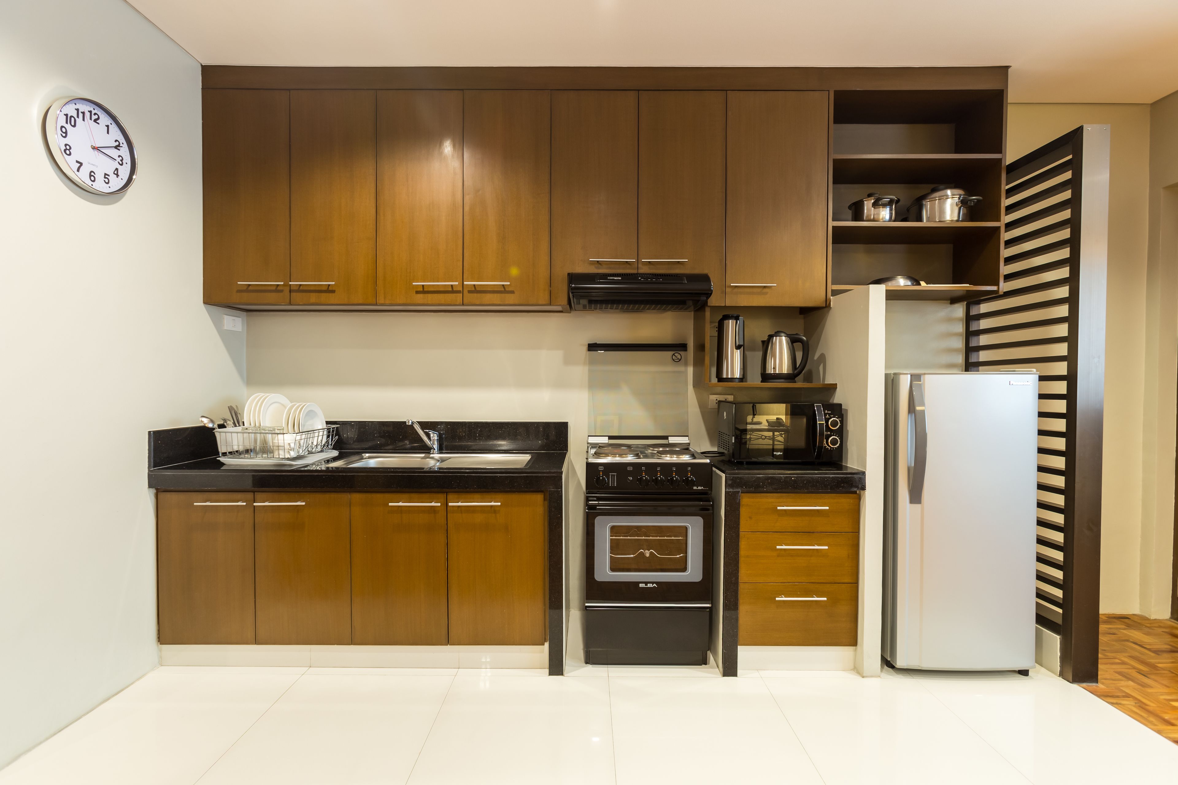 one bedroom superior suite | private kitchen | fridge