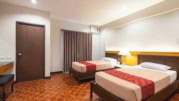 Suite, 2 chambres | Coffre-fort, accès au Wi-Fi (inclus), literie fournie