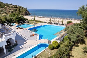 Seasonal outdoor pool, pool umbrellas, sun loungers