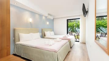 Family Double Room, Garden View | In-room safe, desk, laptop workspace, free WiFi