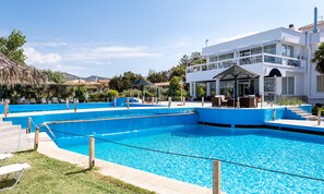 2 outdoor pools, pool umbrellas, pool loungers