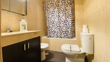 Premium Studio, 1 Bedroom | Bathroom | Combined shower/tub, hair dryer