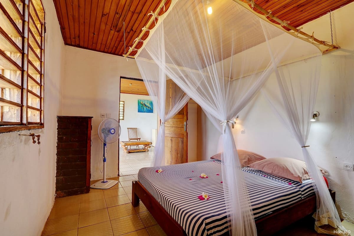 Family Bungalow, 4 Bedrooms | In-room safe, individually decorated, individually furnished, desk