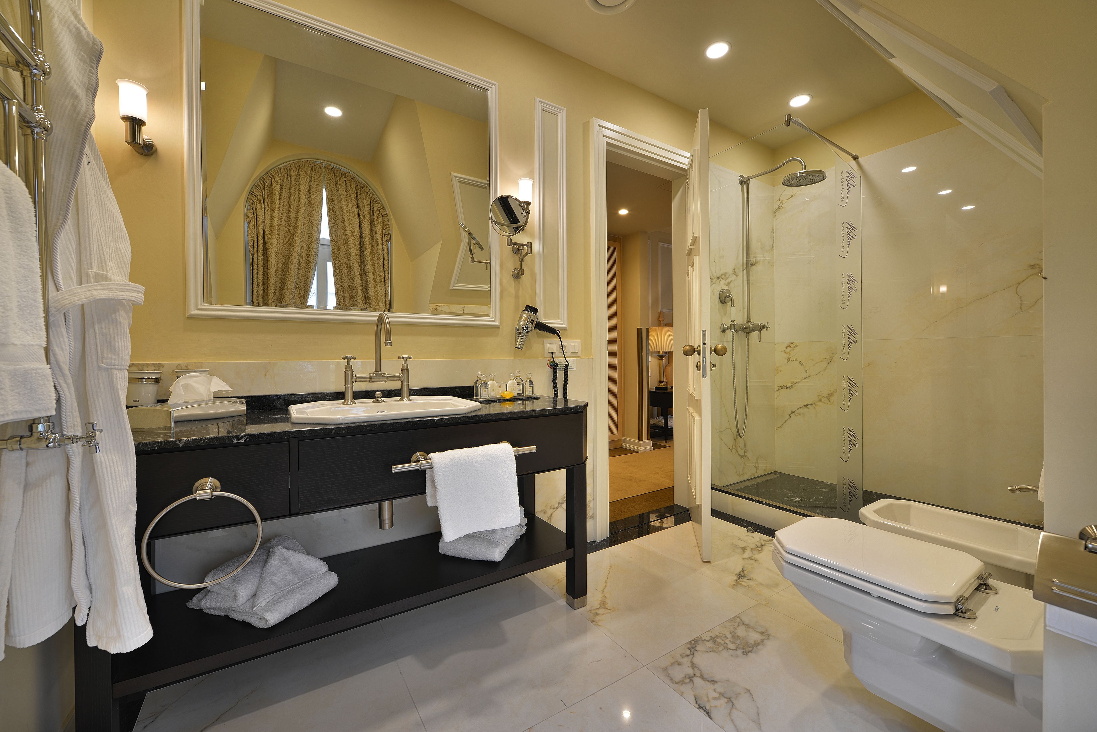 wilson junior suite  | bathroom | free toiletries, hair dryer, slippers, towels