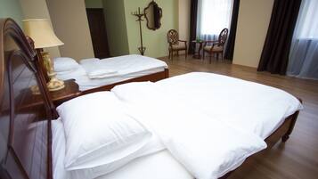Hypo-allergenic bedding, pillow-top beds, in-room safe, desk
