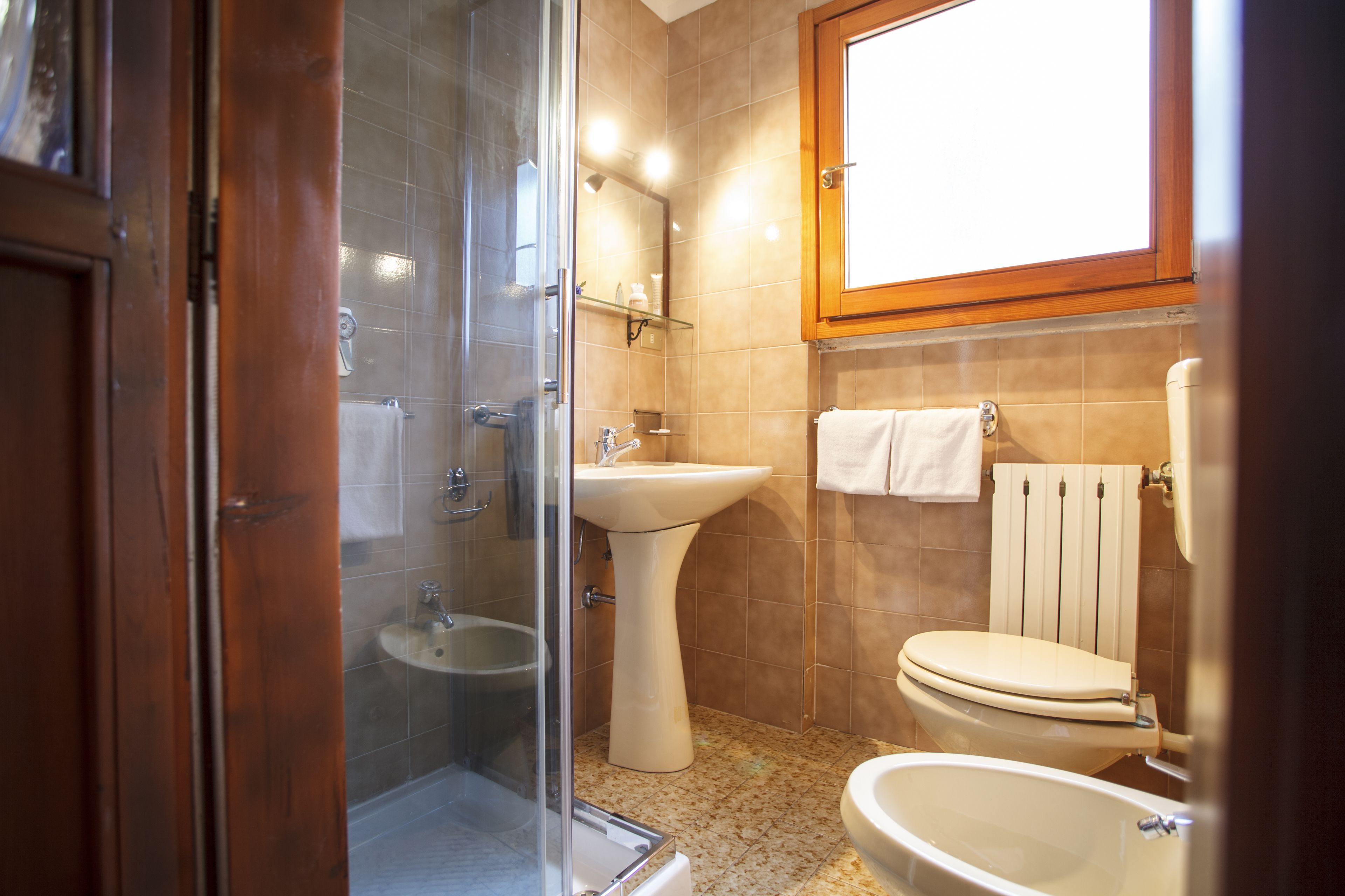 Shower, free toiletries, hair dryer, towels