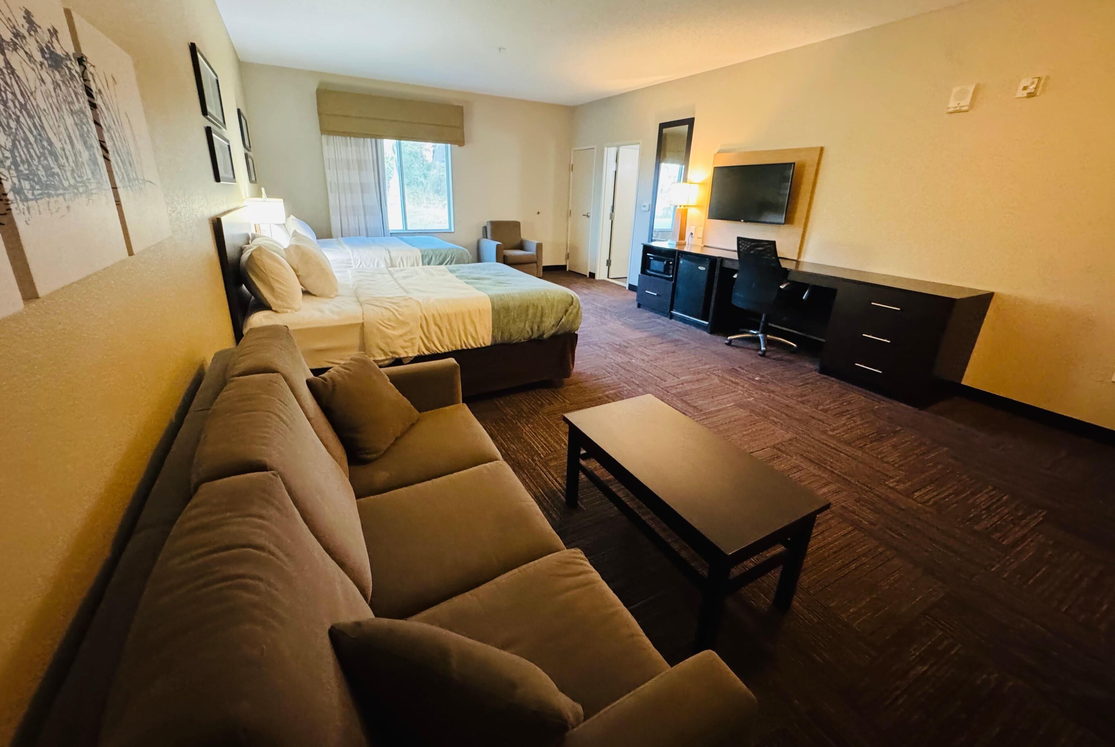 Suite, Multiple Beds, Non Smoking | Desk, iron/ironing board, free WiFi, bed sheets