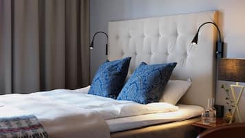 Desk, laptop workspace, blackout drapes, iron/ironing board