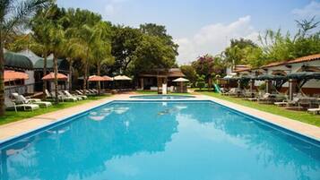 Outdoor pool, open 9:00 AM to 8:00 PM, pool umbrellas, pool loungers
